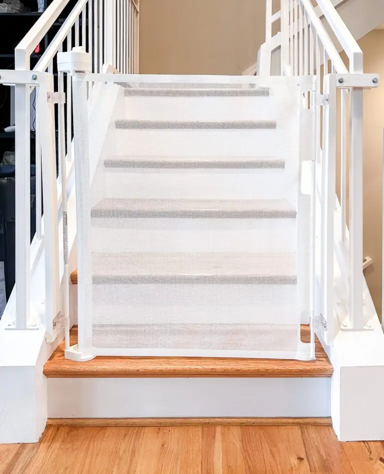White safety gate at staircase