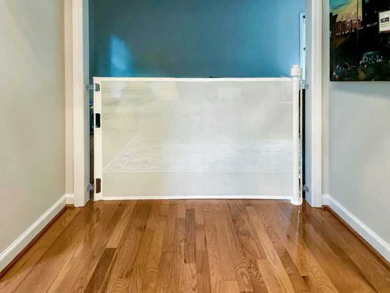 White safety gate in doorway