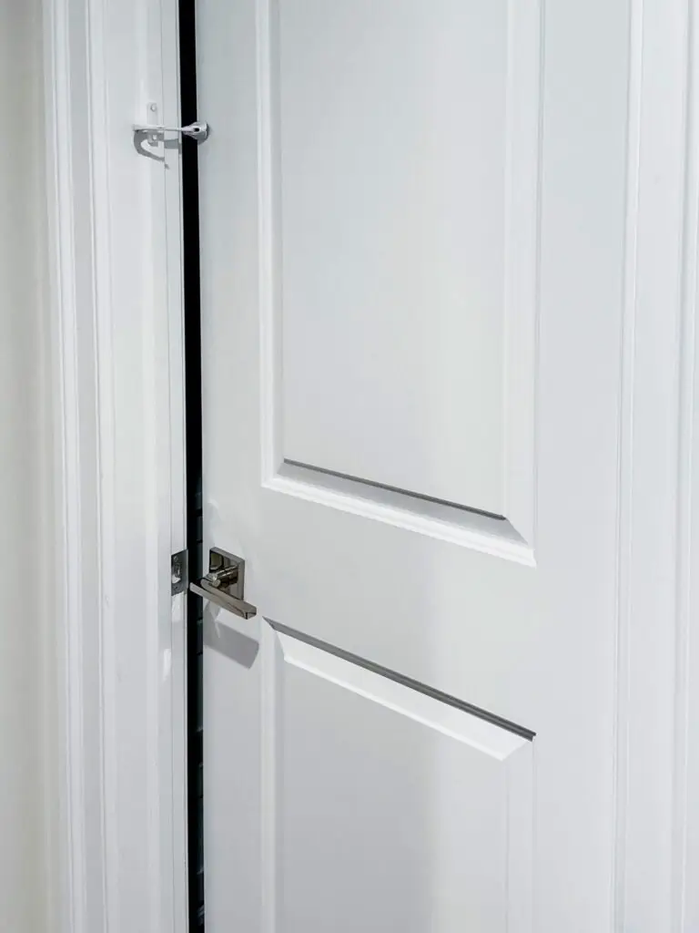Door monkey and catch plate installed on interior door.