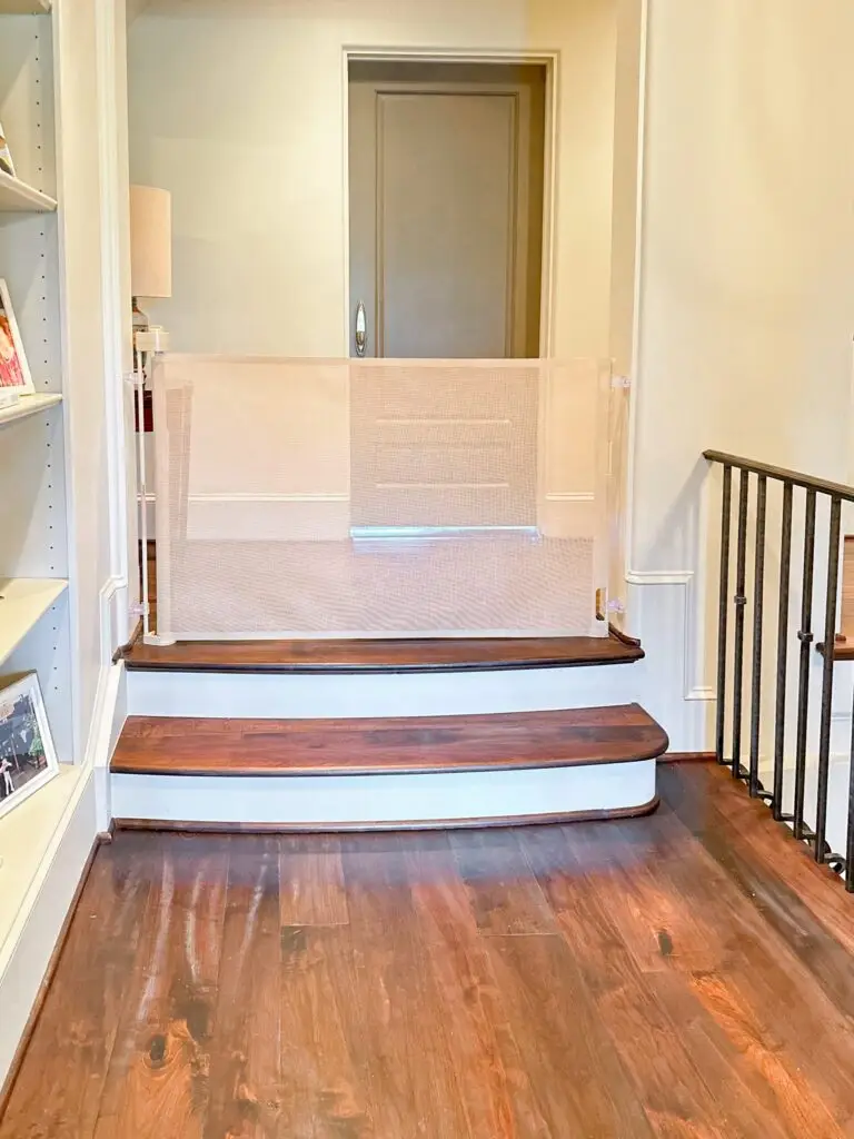 Staircase with safety gate installed.