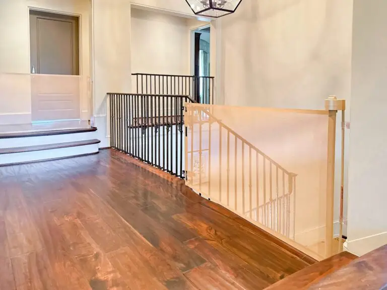 Modern interior with wooden flooring and retractable gate