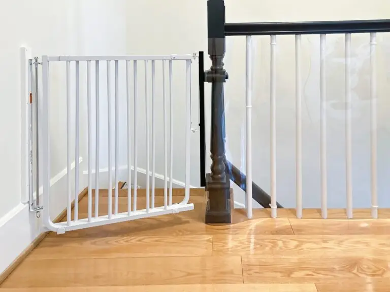 White safety gate at staircase