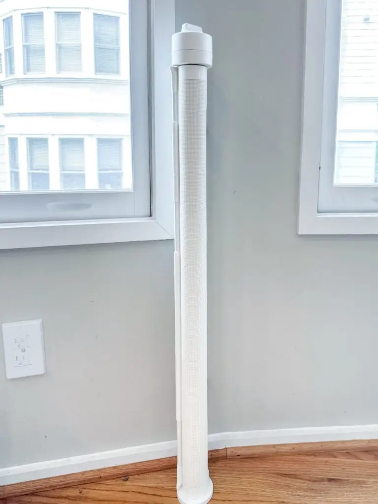 White retractable gate near windows