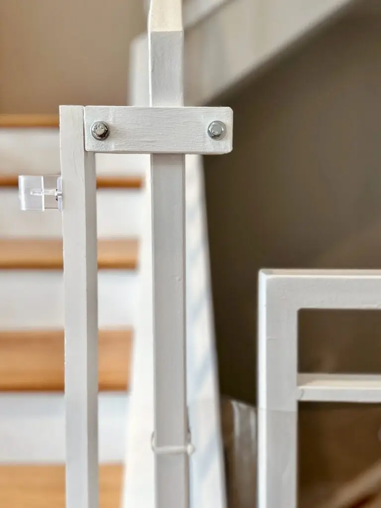 White post clamp on iron railing