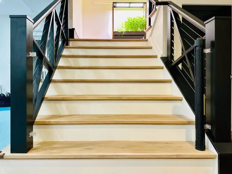 Modern staircase with open retractable gate