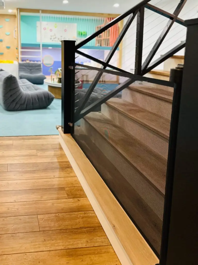 Modern indoor space with black retractable gate