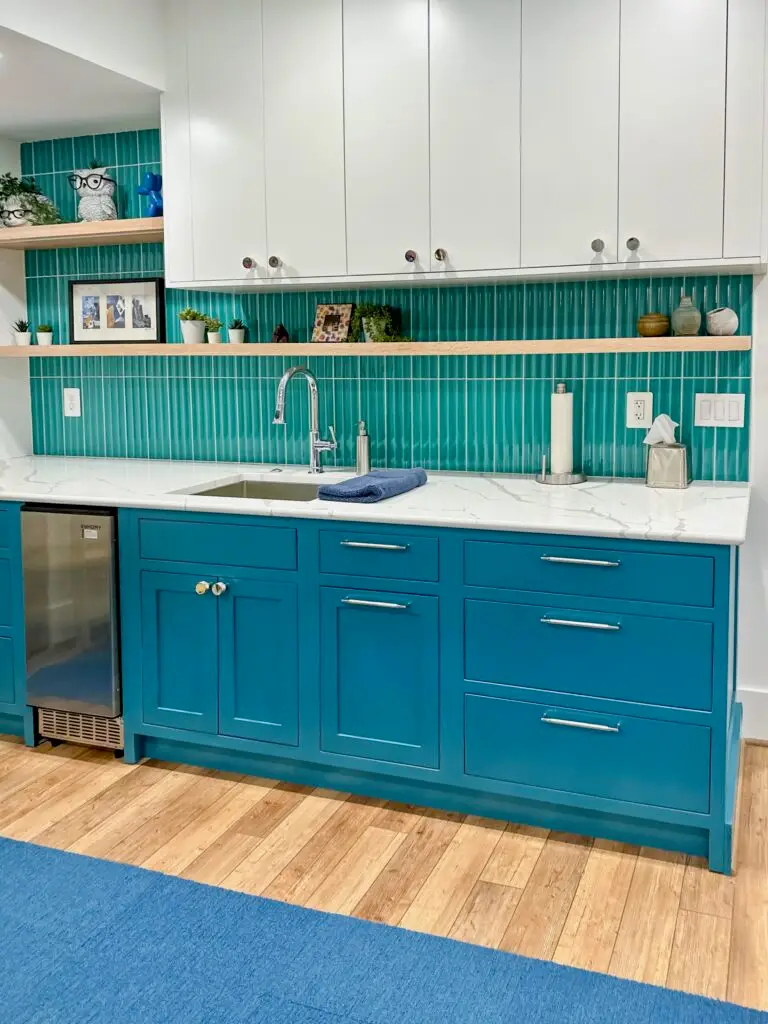 Modern kitchen with teal accents.