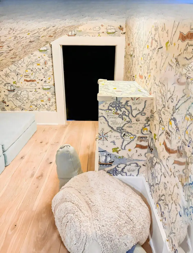 Cozy space with whimsical wallpaper design and corner cushion