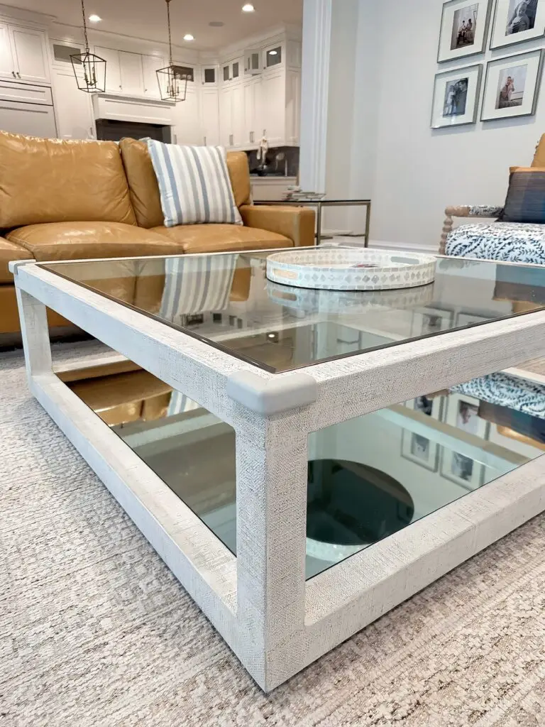 Ivory corner cushion on coffee table in beautiful living room.