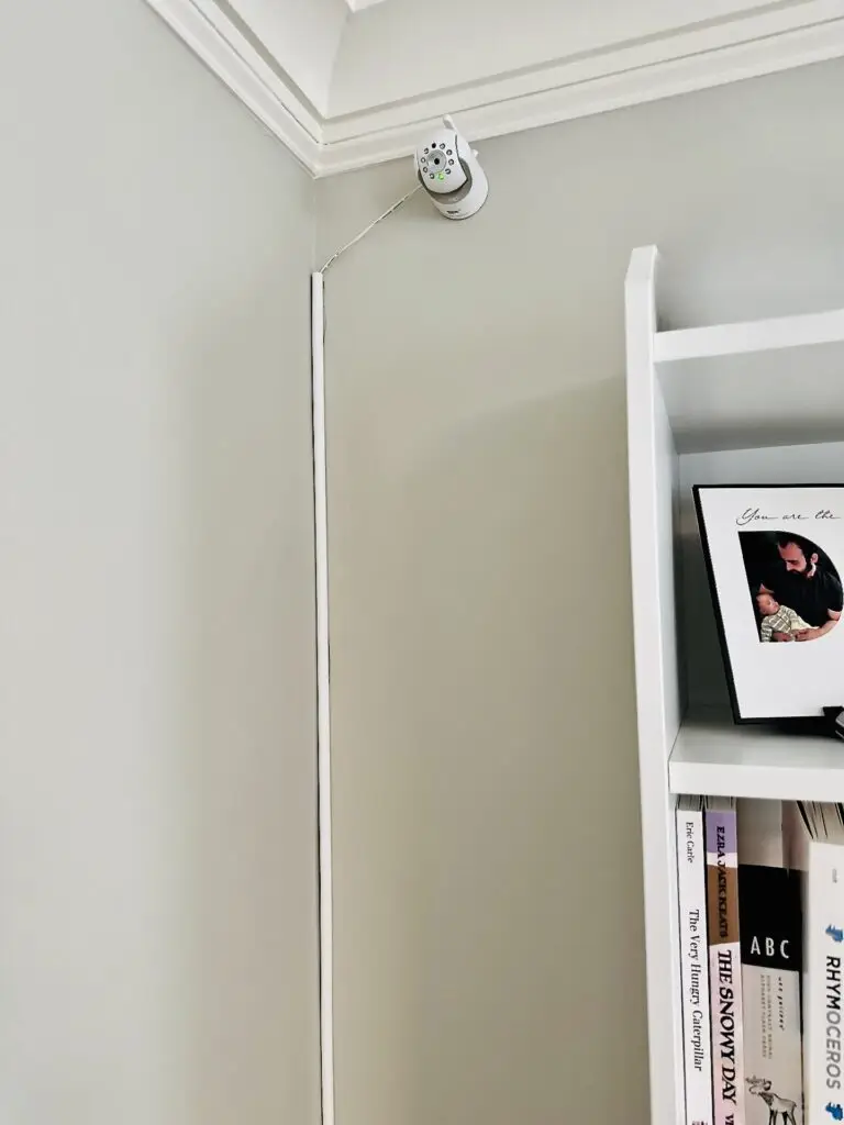 Mounted baby monitor with cord cover