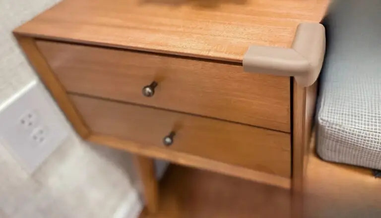 Wooden bench with brown corner cushions