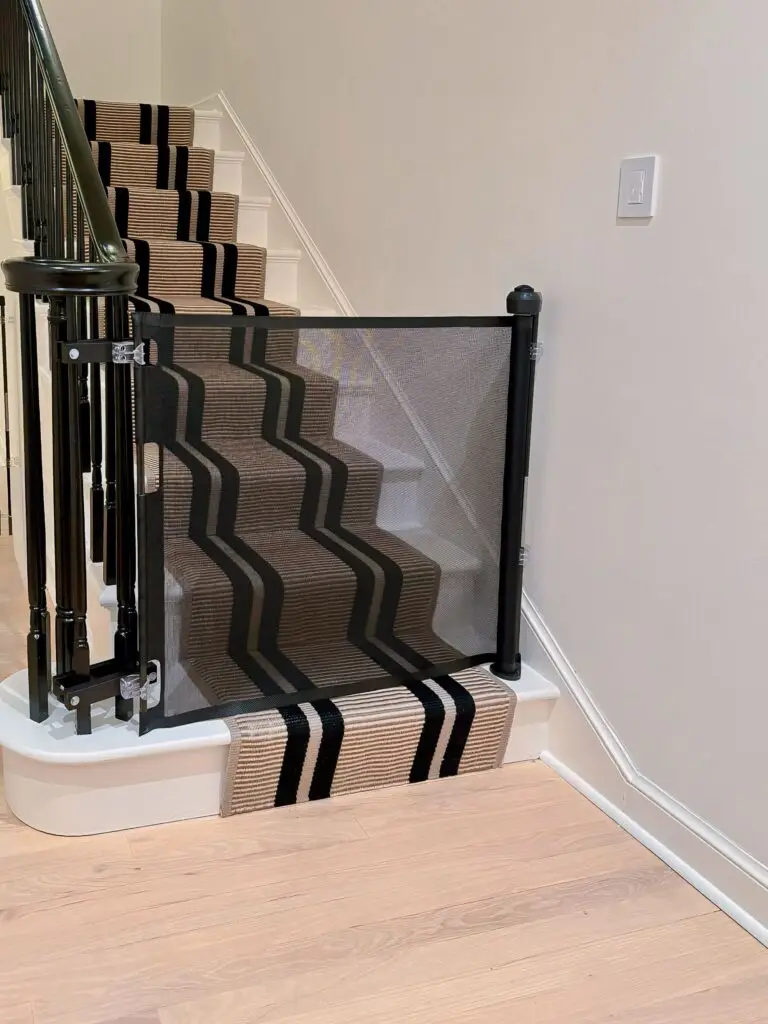 Baby gate installation with striped runner