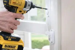 Securing a casement window with a breeze guard