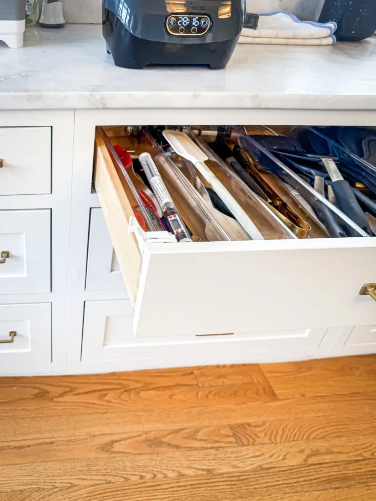 Kitchen drawer fitted with a child-safety drawer latch in a palisades, dc kitchen