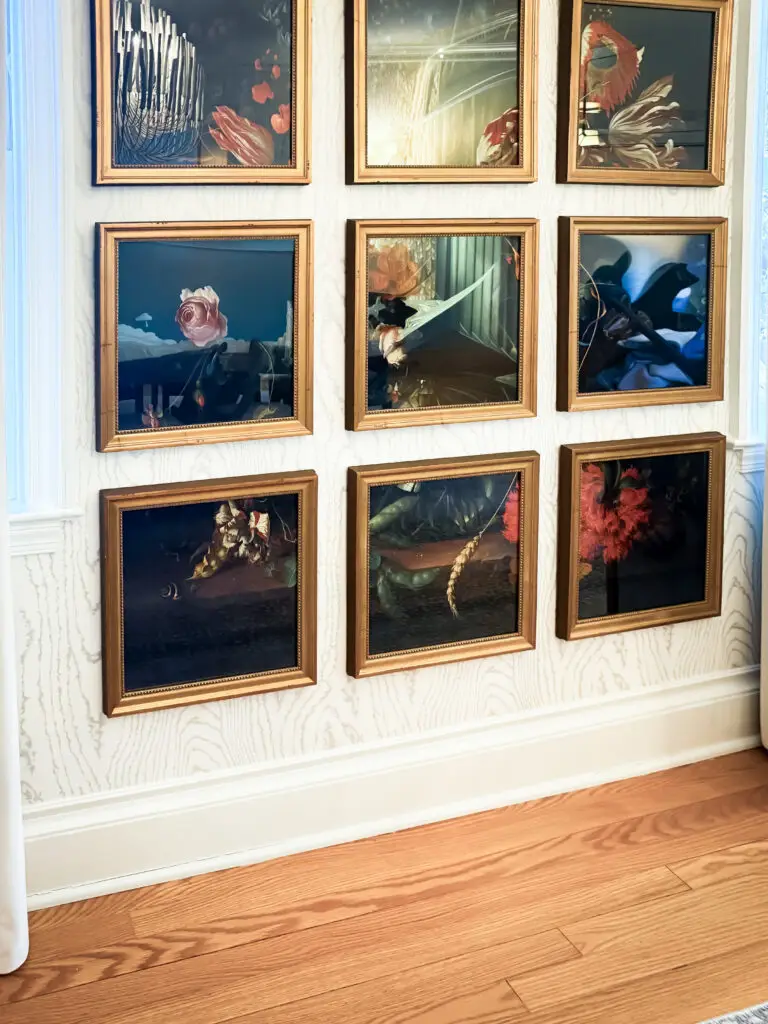 Gallery wall of low-hanging framed art secured with vhb tape in a palisades, dc home
