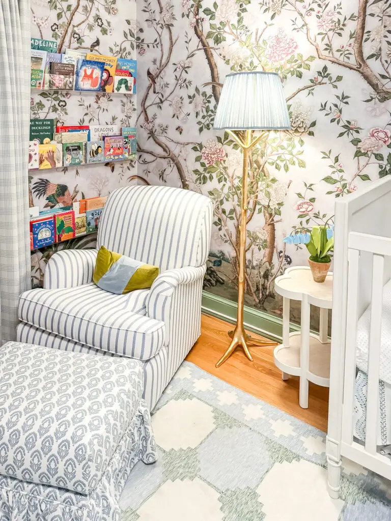 Nursery reading corner with wall-mounted book ledges in a palisades, dc home