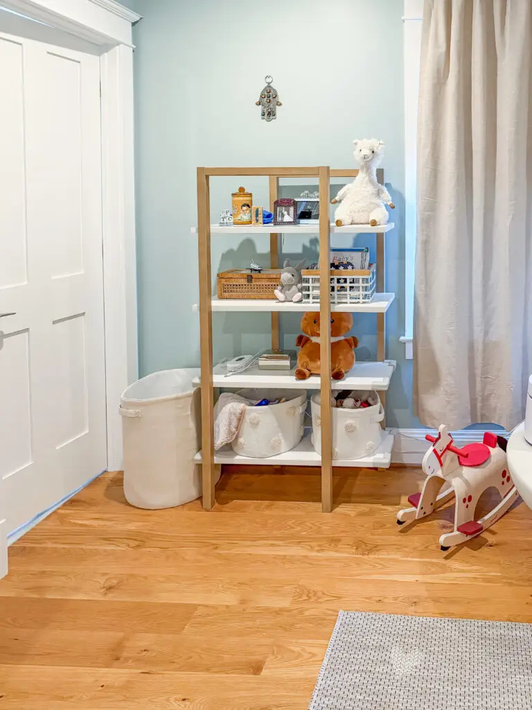 Nursery shelving unit anchored to the wall in a bethesda, md home