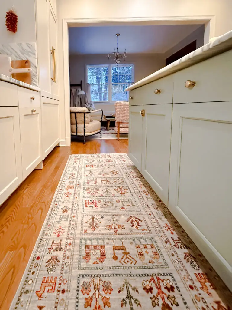 Kitchen with painted cabinetry and latched drawers in a forest hills, dc home