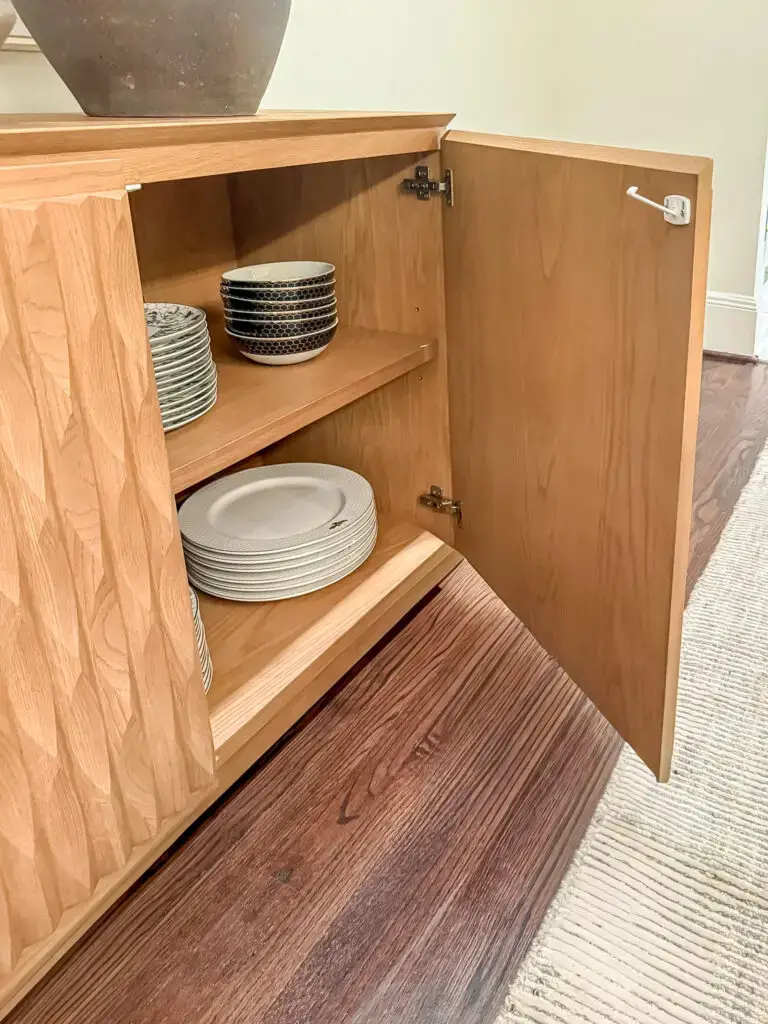 Cabinet latch installed inside the dining buffet door