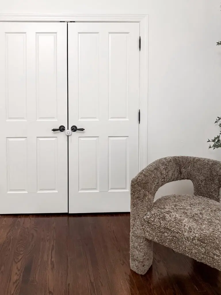 Dual flex lock securing the guest room's double closet doors in a maryland home