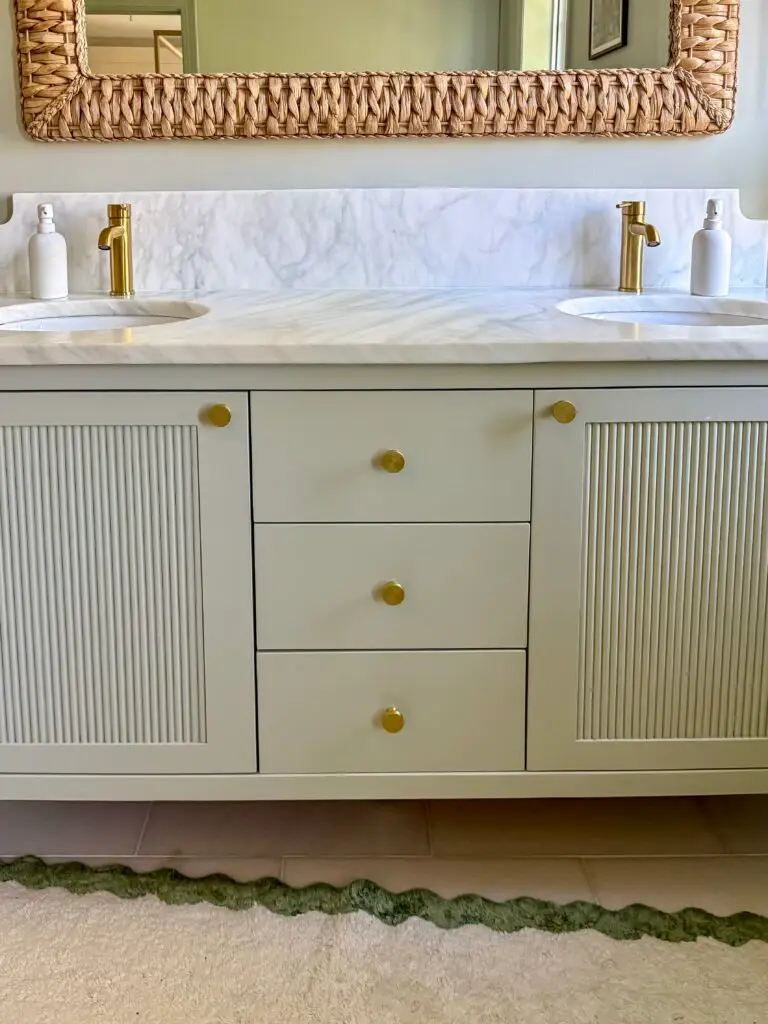 Bathroom vanity with drawers and doors fitted with cabinet latches in a dc rowhouse