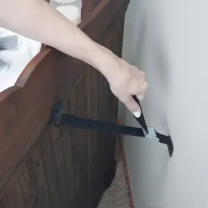 Anchoring with a furniture strap to the wall