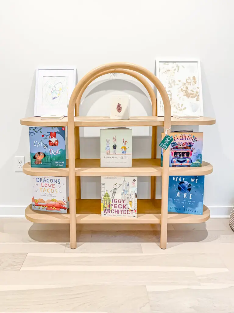 Nursery bookshelf secured to the wall to prevent tip-overs in a forest hills, dc home